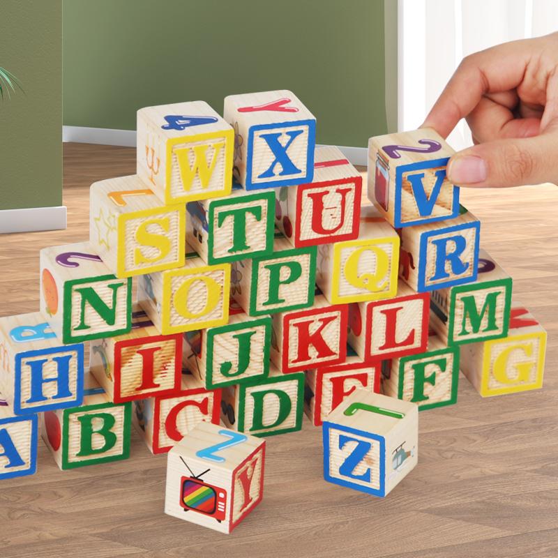 Alphabet blocks stacked on a table